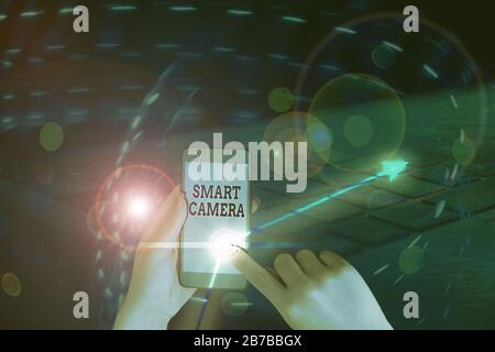Writing note showing Smart Camera. Business concept for individual image processing systems designed to automate Stock Photo