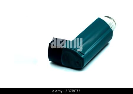 a Blue Ventolin asthma inhaler isolated on a white background Stock Photo