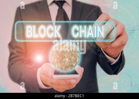 Handwriting text Block Chain. Conceptual photo system in which a record of transactions made in bitcoin Elements of this image furnished by NASA Stock Photo