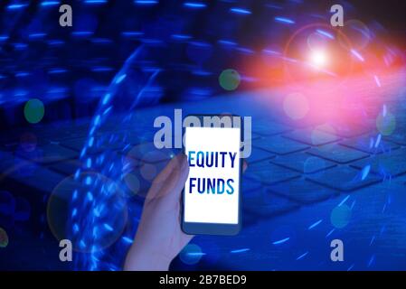 Handwriting text writing Equity Funds. Conceptual photo type of mutual fund that buys ownership in businesses Stock Photo