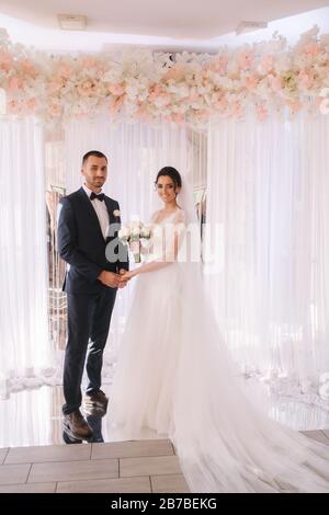 Groom and bride read their wedding vows. Love each other. Stock Photo