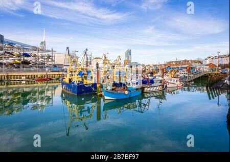 Boats moored in Camber Quay (The Camber), the ancient port in Old Portsmouth, Hampshire, south coast England Stock Photo