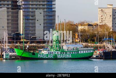 Green lightship Mary Mouse 2 moored at the entrance to Haslar Marina in Portsmouth Harbour viewed from Old Portsmouth, Hampshire, south coast England Stock Photo