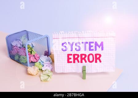Handwriting text writing System Error. Conceptual photo instruction that is not recognized by an operating system Trash bin crumpled paper clothespin Stock Photo