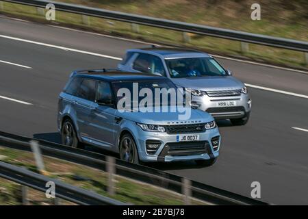 JO8037 Land Rover Range rover Sport Abio Dyn Sdv8 A Silver Diesel driving on the M6 motorway near Preston in Lancashire, UK Stock Photo