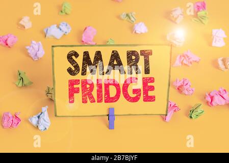 Word writing text Smart Fridge. Business photo showcasing programmed to sense what kinds of products being stored inside Colored crumpled papers empty Stock Photo