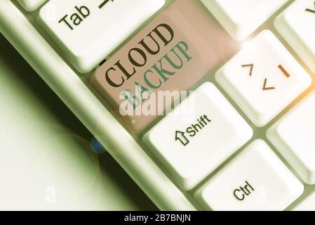 Word writing text Cloud Backup. Business photo showcasing enable customers to remotely access the provider s is services Stock Photo