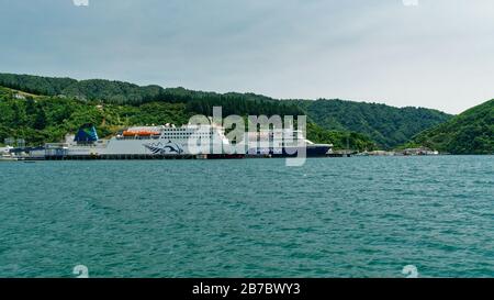 Picton, Marlborough Sounds/New Zealand - February 2, 2020: Inter island Cook Strait ferry terminal with Interislander and Bluebridge ferries. Stock Photo