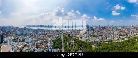 Wuhan skyline and Yangtze river with supertall skyscraper under construction in Wuhan Hubei China. Stock Photo