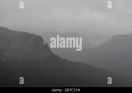 Govetts Leap Lookout on a moody rainy day with heavy fog. Blue Mountains, New South Wales. Stock Photo