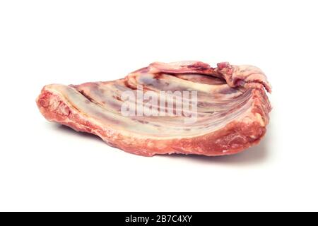 A piece of raw meat on the ribs isolated on white background Stock Photo