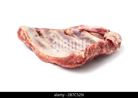 A piece of raw meat on the ribs isolated on white background Stock Photo