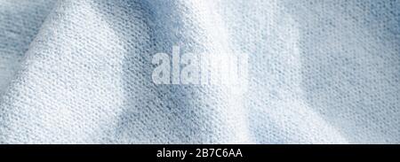 Premium blue fabric texture, decorative textile as background for interior design, close-up Stock Photo