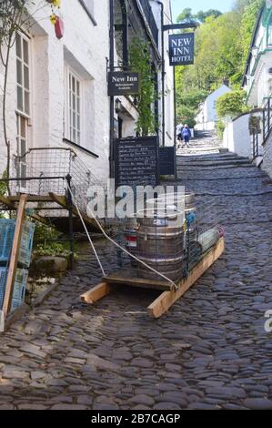 Wooden Beer Sledge for the New Inn Hotel on the Steep Cobbled Street in the Fishing Village of Clovelly on the South West Coast Path, North Devon. Stock Photo