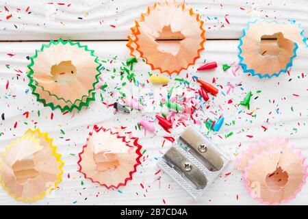 Pencil sharpener on a white wooden background Stock Photo