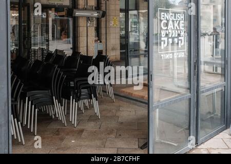 Jerusalem, Israel. 15th Mar, 2020. Restaurants and coffee shops closed as Israeli government imposes further restrictions in light of the COVID-19 outbreak closing all places of leisure, culture and entertainment nationwide for at least 5 weeks, forbidding assembly of more than 10 and instructing social distancing of 2 meters. During the night Netanyahu's Justice Minister announces the judicial system under a ‘state of extraordinary emergency', effectively postponing the beginning of Netanyahu's criminal proceedings by two months. Credit: Nir Alon/Alamy Live News Stock Photo