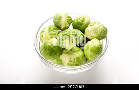 Organic products from market. Brussels sprouts in glass bowl Stock Photo