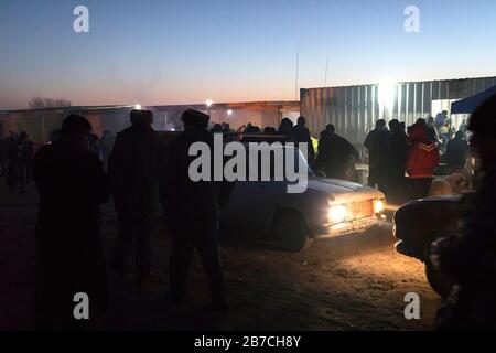 Scene at weekly morning cattle market in a village near Bukhara, Uzbekistan Stock Photo