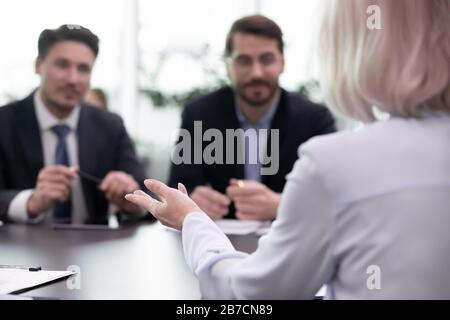 Female job candidate have interview with male employers Stock Photo