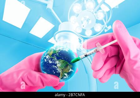 Earth taking an injection in the intensive care unit room. Saving the Earth concept. Stock Photo