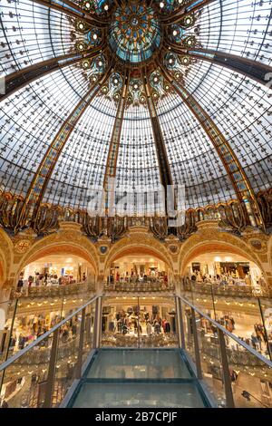 The glass walk suspended below the stained glass dome of Galeries Lafayette department store in Paris, France, Europe Stock Photo