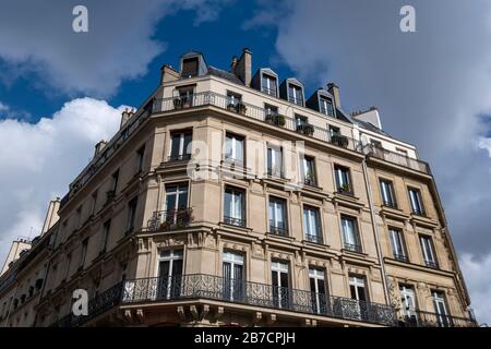 Traditional parisian style apartment building in Paris, France, Europe Stock Photo