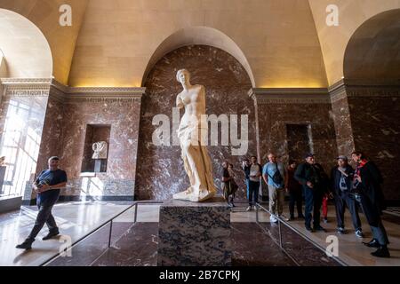 The Venus de Milo ancient greek marble statue by artist Alexandros of Antioch at the Louvre Museum, Paris, France, Europe Stock Photo