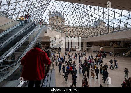 The Louvre Museum entrance atrium seen from inside the glass pyramid, Paris, France, Europe Stock Photo