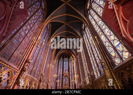 The Sainte-Chapelle church walls filled with colorful stained glass window panels in Paris, France, Europe Stock Photo