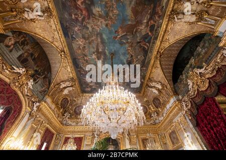 Ornate chandelier and painted ceiling at the State Drawing Room in Napoleon III Apartments at the Louvre museum, Paris, France, Europe Stock Photo