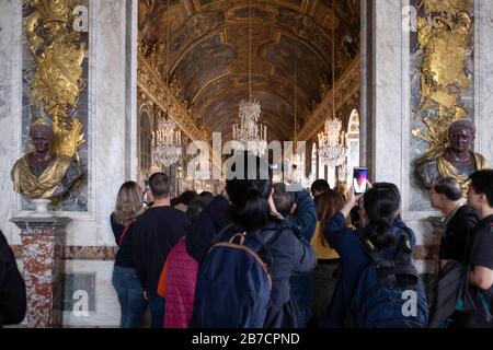 Crowd of tourists blocking the entrance door to the Hall of Mirrors at the Palace of Versailles in the outskirts of Paris, France, Europe Stock Photo