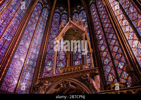 The Sainte-Chapelle church walls filled with colorful stained glass window panels in Paris, France, Europe Stock Photo