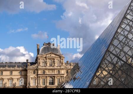 The Louvre Museum and the glass pyramid in Paris, France, Europe Stock Photo