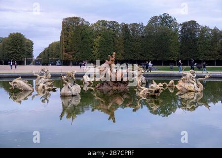 The Dragon fountain at the Gardens of the Versailles Palace, France Stock Photo