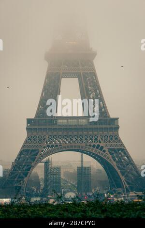 The eiffel tower covered in fog, travel, tourism, france, paris, achitecture Stock Photo