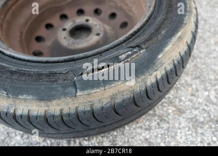 Close up of an old blown out tire ruined by excessive use Stock Photo