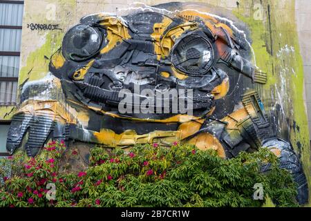 Colorful grafitti and trash collage by artist Artur Bordalo aka Bordalo II on a wall in the streets of Águeda, Portugal, Europe Stock Photo