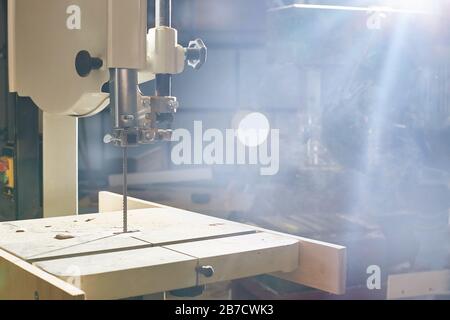 Woodworking Machine. band saw for cutting and sawing boards in a workshop. Nobody Stock Photo