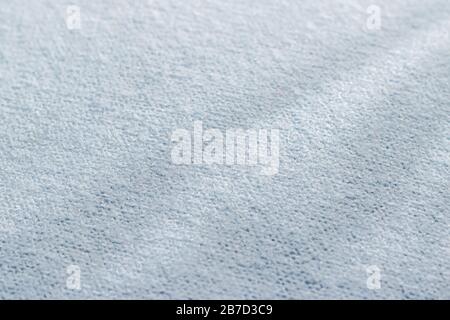 Premium blue fabric texture, decorative textile as background for interior design, close-up Stock Photo