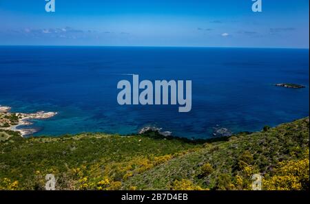 Green mountainous coast of the Mediterranean Sea on the Akamas Peninsula in the northwest of the island of Cyprus. Stock Photo