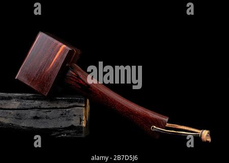 Mallet hammer wood made of rosewood tool handmade of Thailand for used by a carpenter in the workshop on isolated white background Stock Photo