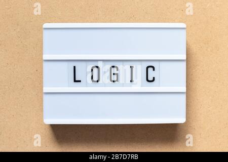 White lightbox with word logic on wood background Stock Photo