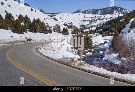 Utah Scenic Byway in Winter:  Logan Canyon National Scenic Byway climbs through the Mt. Naomi Wilderness Area toward Bear Lake in northeast Utah. Stock Photo