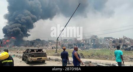 Lagos, Nigeria. 15th Mar, 2020. Photo taken on March 15, 2020 shows the site of an oil pipeline explosion in a satellite town of Lagos, Nigeria. An oil pipeline explosion on Sunday hit a satellite town of Lagos, Nigeria's economic hub, and casualties are feared, a rescue official told Xinhua. Credit: Emmanuel/Xinhua/Alamy Live News Stock Photo