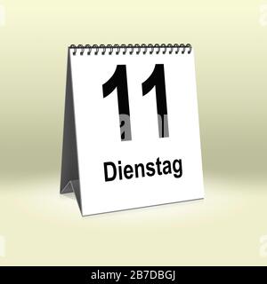 A calendar in German language shows Tuesday 11th | Ein Kalender für den Schreibtisch zeigt Dienstag 11. Stock Photo