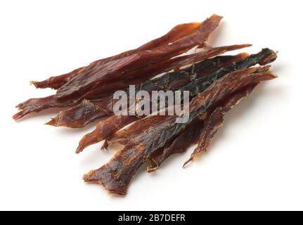 Dried salted tuna meat strips isolated on white Stock Photo