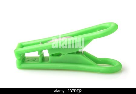 Side view of green plastic clothespin isolated on white Stock Photo