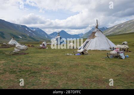 A camp of modern reindeer herders in the foothills of the polar Urals. Yamal-Nenets Autonomous Okrug, Russia Stock Photo