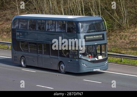 Hydrogen-powered, fuel cell bus Enviro400; Alexander Dennis grey double-decker bus luxury style bus travelling on the M6 Manchester, UK Stock Photo