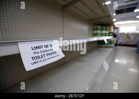 Cleveland, USA. 15th Mar, 2020. A sign is shown on the shelf of a Discount Drug Mart limiting the number of packages of toilet paper that can be purchased at a store in Medina, Ohio Sunday, March 15, 2020. Many communities have seen panic buying and hoarding caused by the coronavirus pandemic. Photo by Aaron Josefczyk/UPI Credit: UPI/Alamy Live News Stock Photo